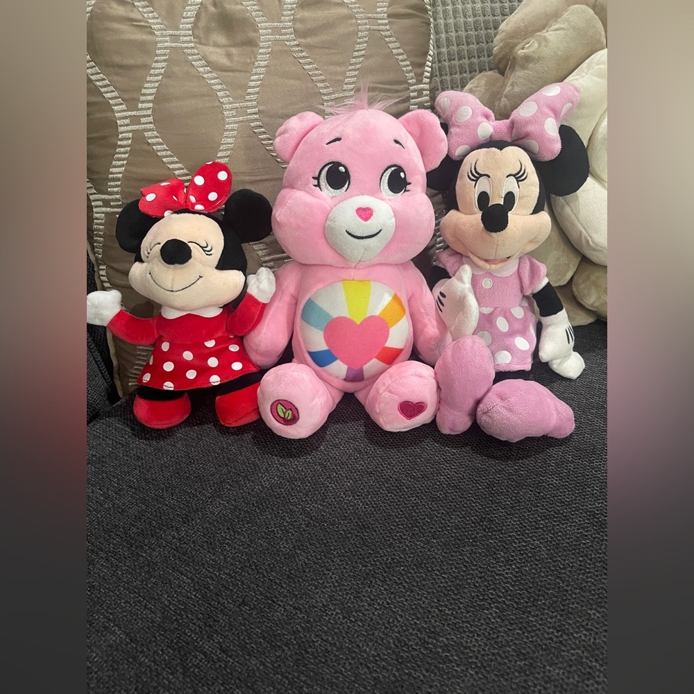 3 stuffed animals Minnie,  care bear,  and talking Minnie